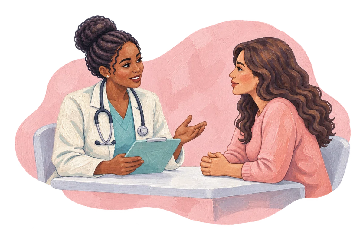 A healthcare professional having a welcoming consultation with a woman