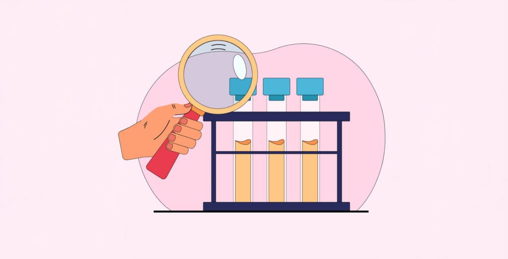 Test tubes under magnifying glass